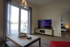  Penthouse am Deich Büsum - Wohnzimmer
