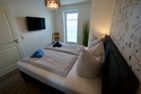 Bernstein Suite & Breakfast Apartment 1 Büsum - Schlafzimmer