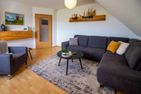  Ferienwohnung am Sieltief Krummhörn - Wohnzimmer