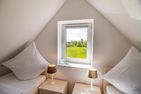  Ferienwohnung am Sieltief Krummhörn - Schlafzimmer