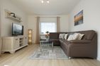  Ferienhaus Küstenglück Büsum - Wohnzimmer