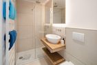 Haus Dünenkate Strandmuschel Ostdorf - Badezimmer
