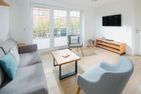 Haus Dünenkate Möwennest Ostdorf - Wohnzimmer