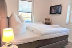 Bernstein Mare Rose Penthouse 1 Büsum - Schlafzimmer