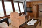 Büsumer Hochhaus Wohnung Jacqueline Büsum - Wohnzimmer