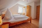  Haus Leuchtturm - Ebbe Krummhörn - Schlafzimmer
