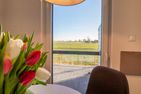  Ferienhaus Weitblick Krummhörn - Wohnzimmer