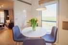  Ferienhaus Weitblick Krummhörn - Wohnzimmer