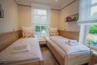  Up Besöök - Magnolie mit Sauna im Garten Krummhörn - Schlafzimmer