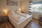  Ferienhaus Sita Krummhörn - Schlafzimmer