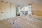  Ferienhaus Sita Krummhörn - Schlafzimmer