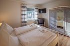  Ferienhaus Sita Krummhörn - Schlafzimmer