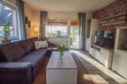  Ferienhaus Sita Krummhörn - Wohnzimmer