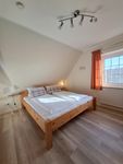 Haus am Brunnen Mühlenblick 1 Wohnung Mohn Werdum - 