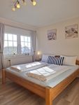 Haus am Brunnen Mühlenblick 1 Wohnung Mohn Werdum - 