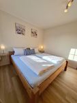 Haus am Brunnen Mühlenblick 1 Wohnung Mohn Werdum - 