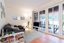  Ferienhaus Seeweg Wohnung 1 Scharbeutz - Wohnzimmer