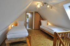  Ferienwohnung Elke Am Harlebogen 9 Whg. 3 Carolinensiel - Schlafzimmer
