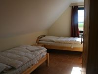  Ferienwohnung Carolinengroden Carolinensiel - Schlafzimmer
