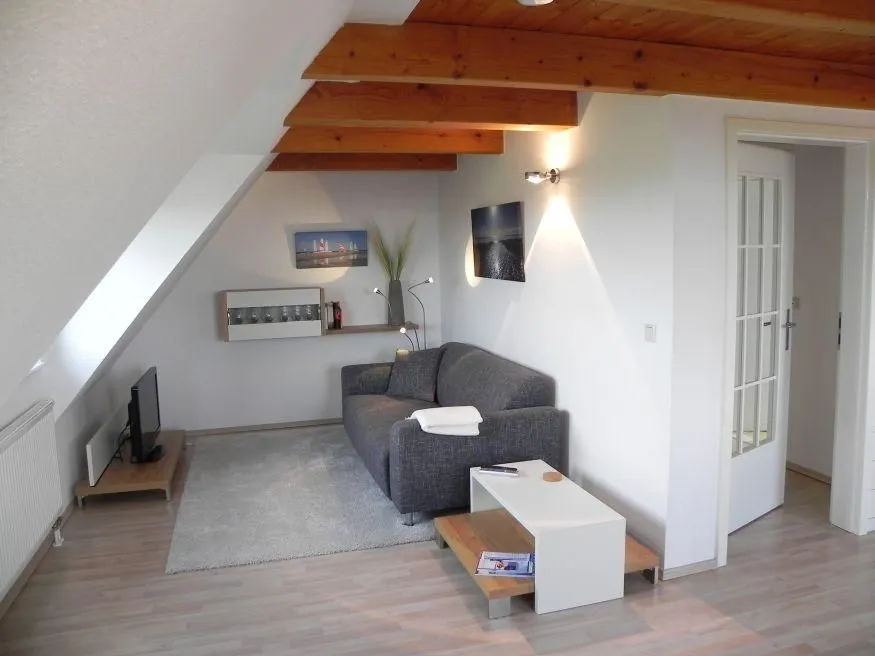 Haus Nordlicht Ferienwohnung *Auer Lun* Nebel auf Amrum - Sofa in der Ferienwohnung Auer Lun in Nebel auf Amrum