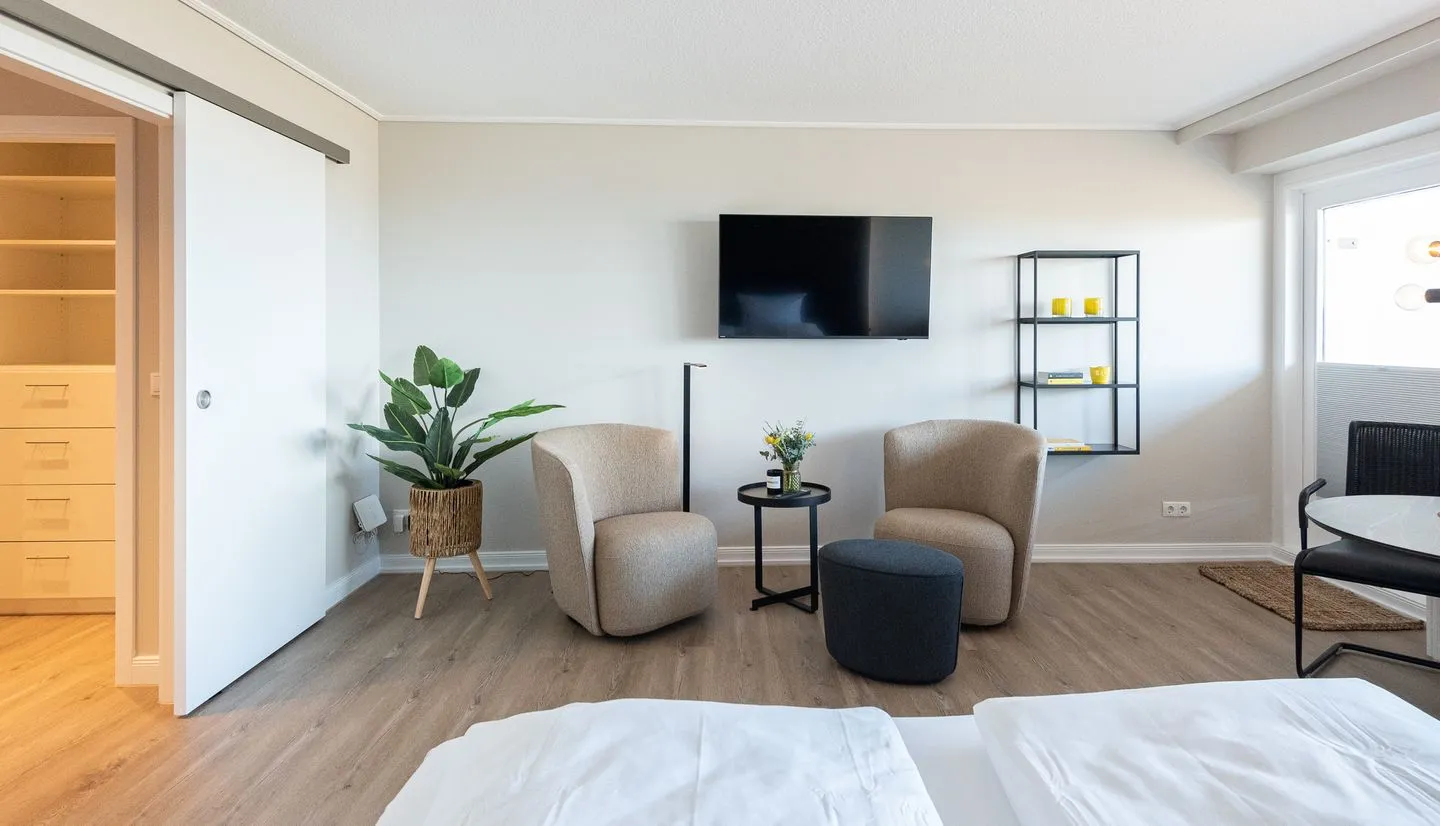 Meerblick - Logenplatz 64 Wenningstedt - Wohnzimmer