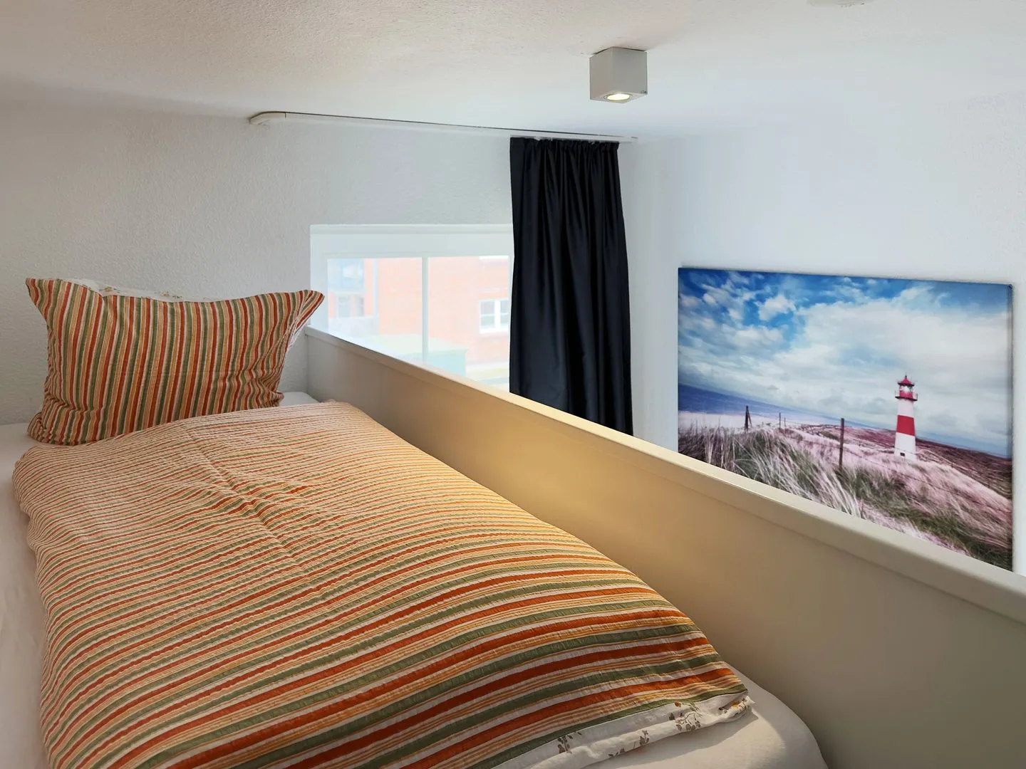 Haus *Südspitze 18* Ferienwohnung Südspitze 18/6 - Meerblick Wittdün auf Amrum - Hochbett im Schlafzimmer in der Ferienwohnung Südspitze 18/6 Meerblick in Wittdün auf Amrum