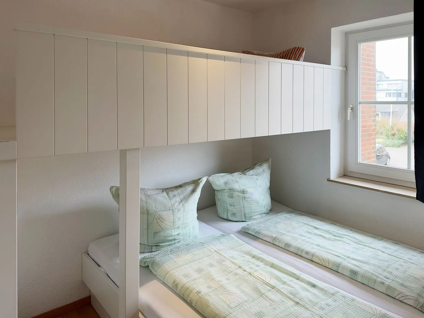 Haus *Südspitze 18* Ferienwohnung Südspitze 18/6 - Meerblick Wittdün auf Amrum - Schlafzimmer in der Ferienwohnung Südspitze 18/6 Meerblick in Wittdün auf Amrum