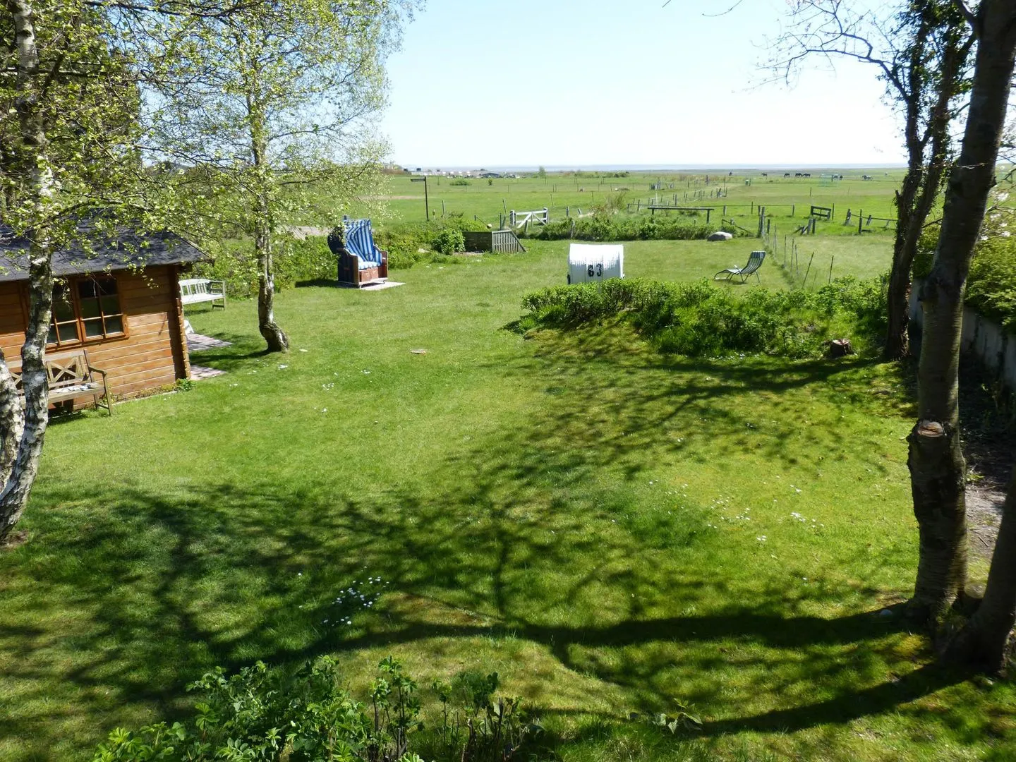 Haus Pesel Ferienwohnung *Reetblick* Norddorf auf Amrum - Garten mit Meerblick der Ferienwohnung Reetblick in Norddorf auf Amrum