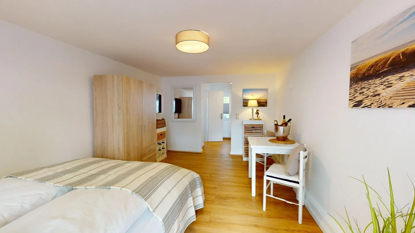 Küstenplatz - Seepferdchen - mit zwei Sonnenterrassen Timmendorfer Strand - Wohnzimmer