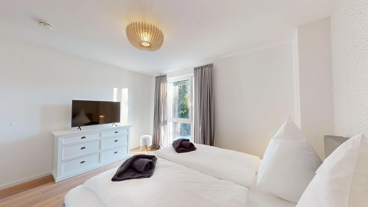 Strandglück - mit Balkon & Meerblick, direkt am Strand - Schlafzimmer