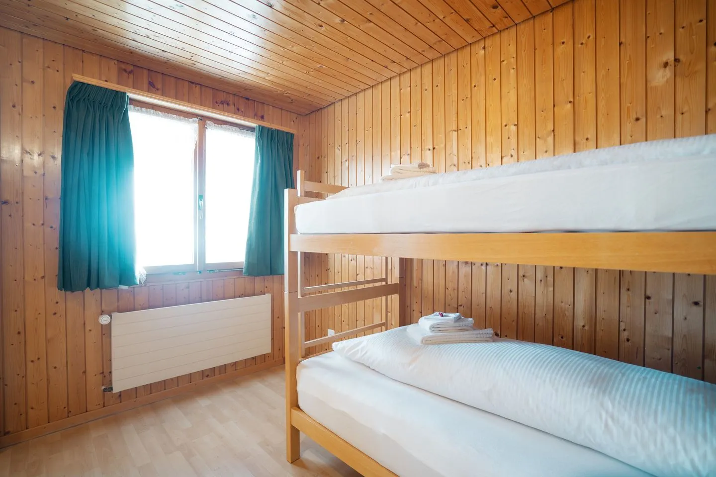 Apartment Bergdohle Amden - Schlafzimmer mit Etagenbett