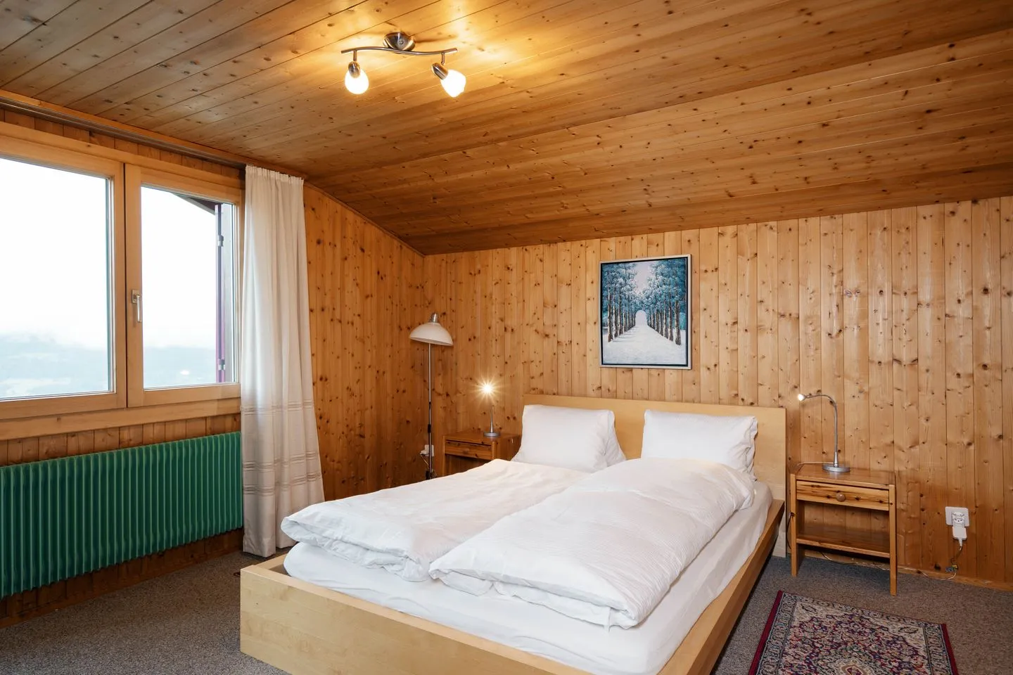 Apartment Sidonie Amden - Schlafzimmer mit Doppelbett
