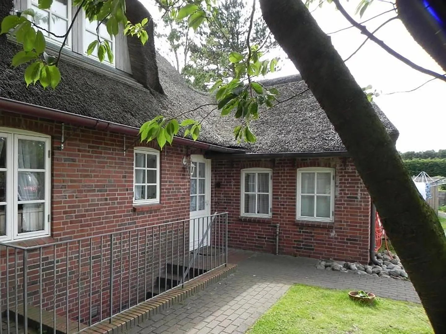 Hüs Sanskiin Ferienwohnung *Hopelfask* Süddorf auf Amrum - Fassade / Eingang