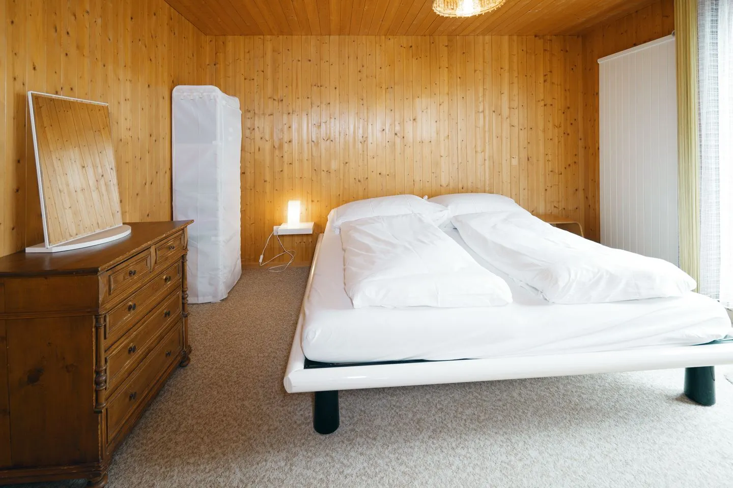Chalet Biodola Amden - Schlafzimmer mit Doppelbett