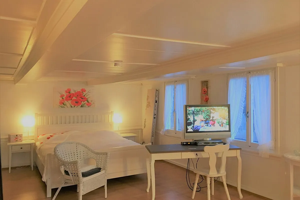 Apartment Karli 2 Amden - Schlafzimmer mit Doppelbett