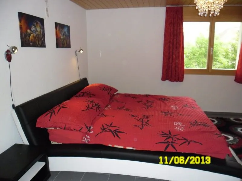 Apartment Aeschen Mirador Amden - Bedroom with double bed