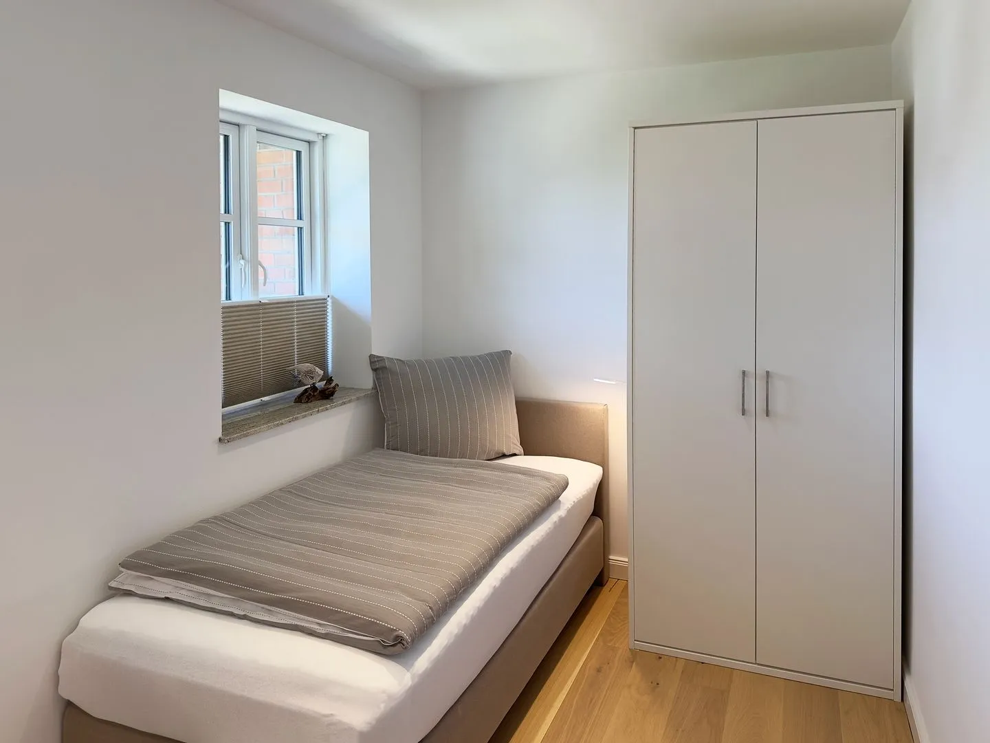 Haus Dünenperle Ferienwohnung "Wanderdüne" Wittdün auf Amrum - Schlafzimmer