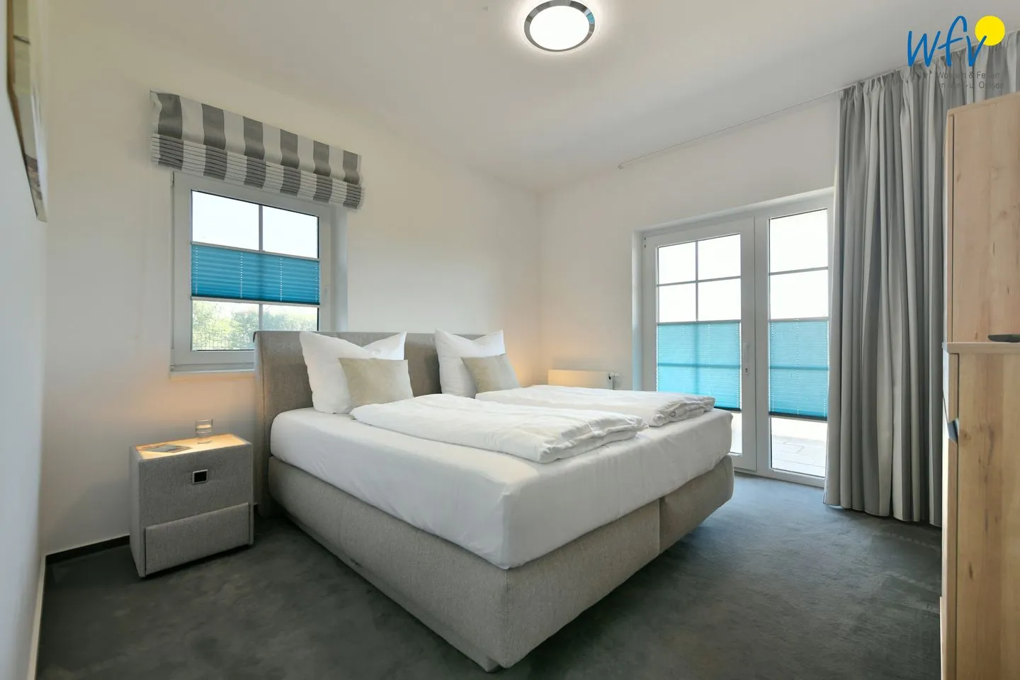 Ferienhaus am Gutspark Dranske Ferienwohnungen Sonnenaufgang und Sonnentag Rügen - Dranske - Schlafzimmer