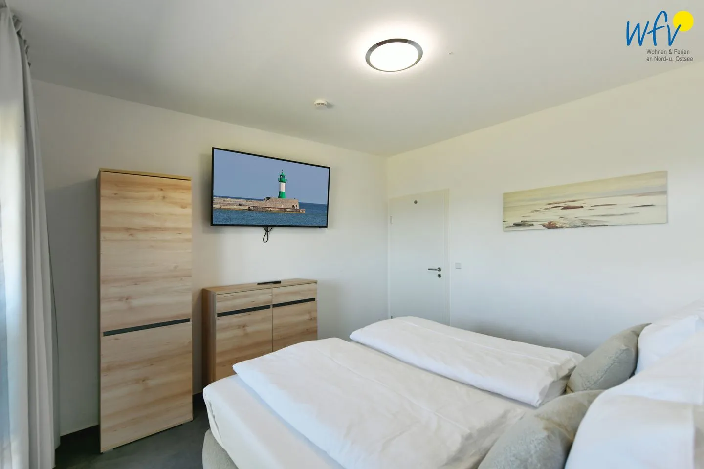 Ferienhaus am Gutspark Dranske Ferienwohnungen Sonnenaufgang und Sonnentag Rügen - Dranske - Schlafzimmer