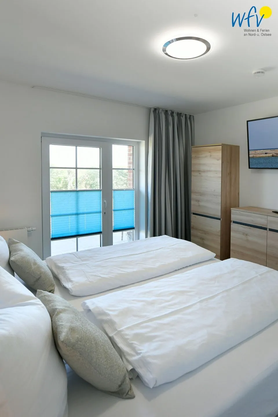 Ferienhaus am Gutspark Dranske Ferienwohnungen Sonnenaufgang und Sonnentag Rügen - Dranske - Schlafzimmer