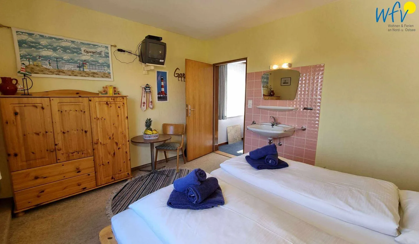 Haus Feldmann Ferienwohnung Lüttje Dröm Borkum - Schlafzimmer