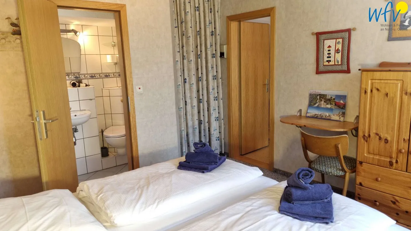 Haus Feldmann Kleine Ferienwohnung Lüttje Dröm Borkum - Schlafzimmer