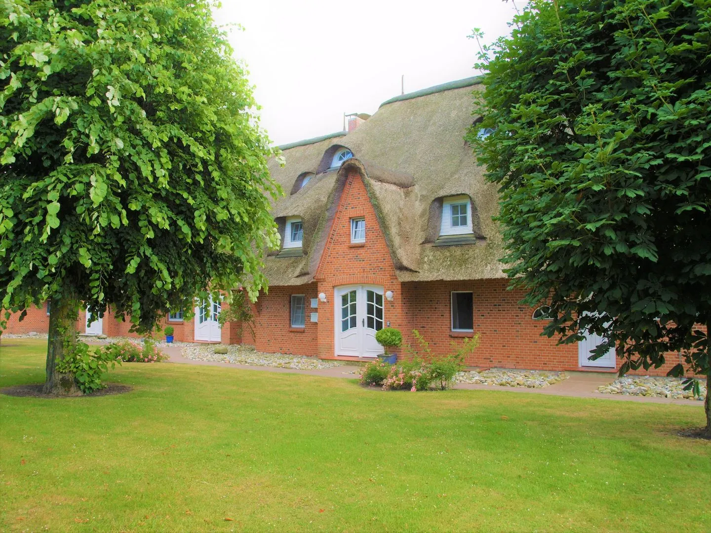 Hus op de Wurth Ferienwohnung Deichblick Dithmarschen - Fassade / Eingang