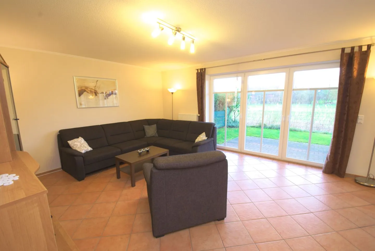 Ferienhaus Schott Norddeich - Wohnzimmer