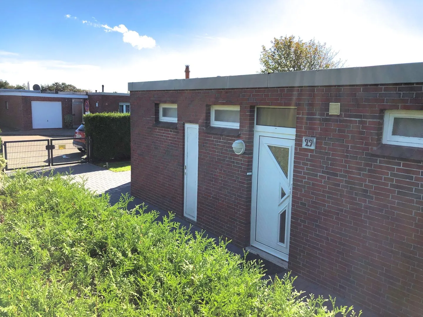 Ferienhaus Seefalkenstr. 29 Norddeich - Fassade / Eingang