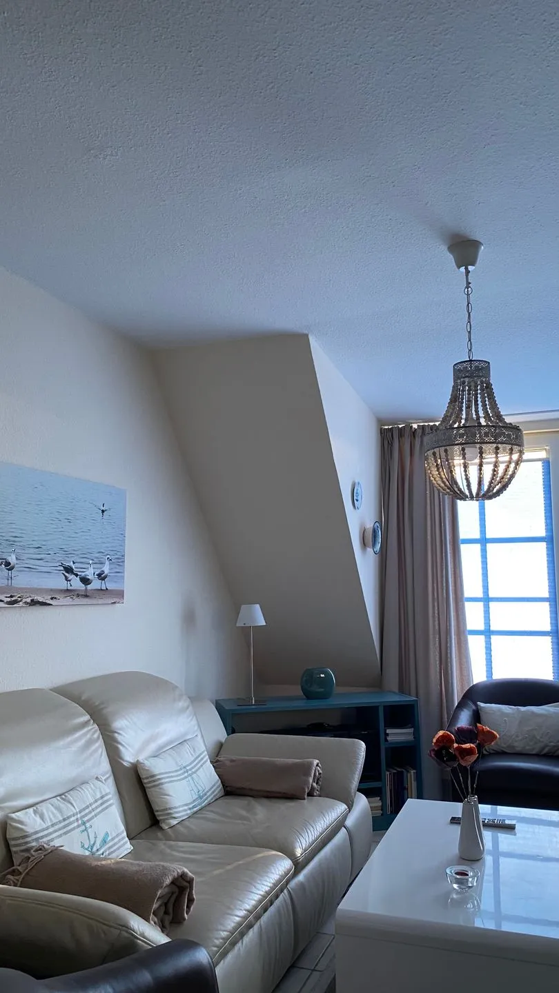 Hus op de Wurth Ferienwohnung Seeblick Dithmarschen - Wohnzimmer
