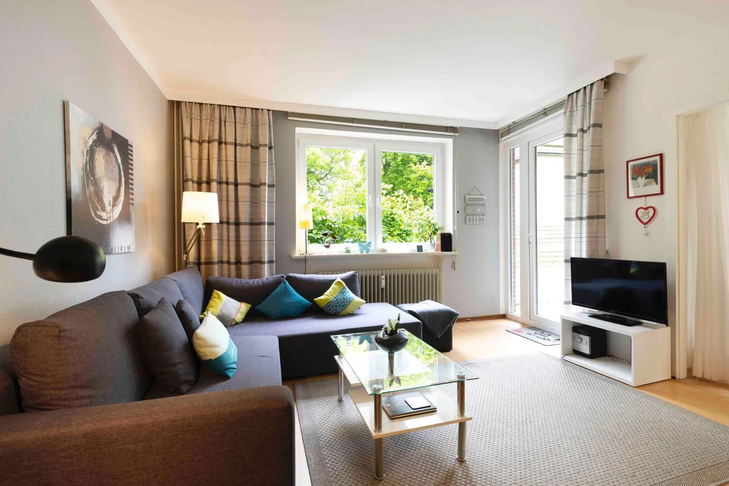 (PAR1c) Ferienwohnung "Weßling" Niendorf - Wohnzimmer
