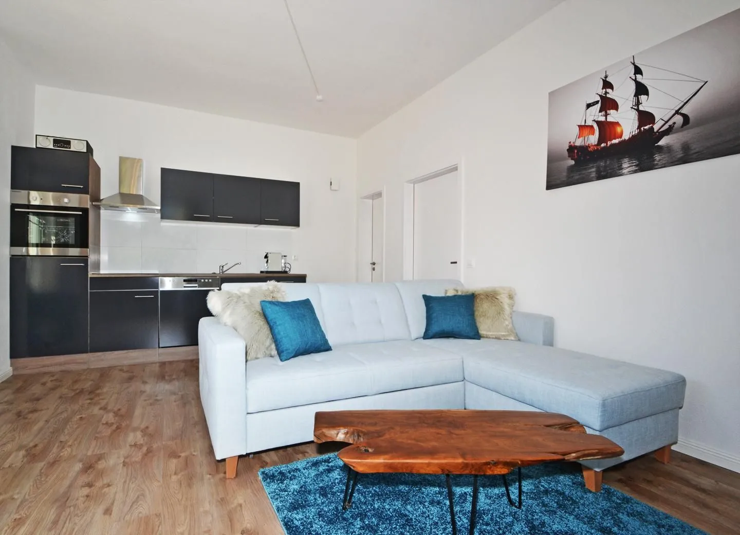 Haus Usedom Fewo MeeresBucht Ostseebad Koserow - Wohnbereich mit Couch und TV