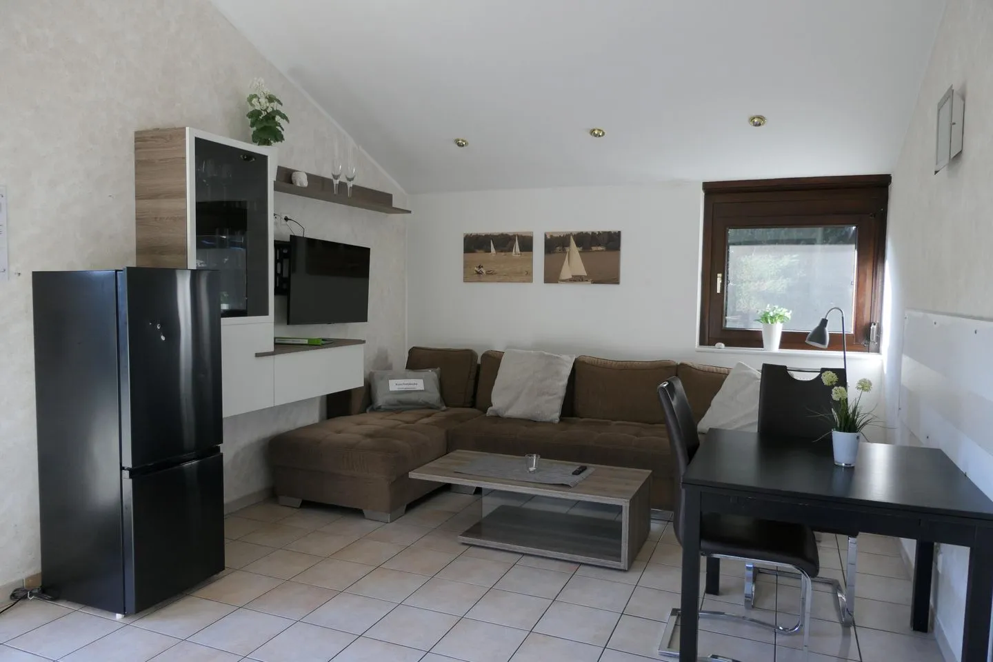 Haselbusch - Lastering Ferienhäuser & Apartments Haddorf - Wohnzimmer