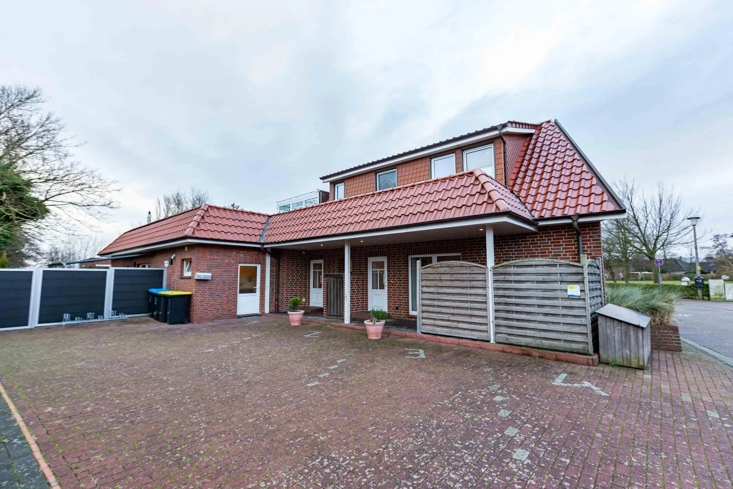 Huus an de Tune Ferienwohnung Fidellapje Borkum - Fassade / Eingang